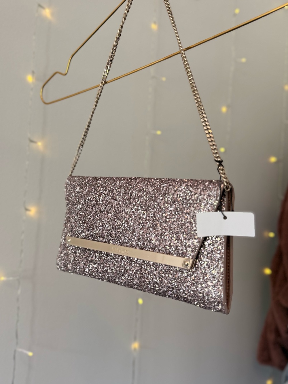 Jimmy Choo Margot Chain Clutch with Gold Bar – Tea Rose Glitter
Brand New in Box